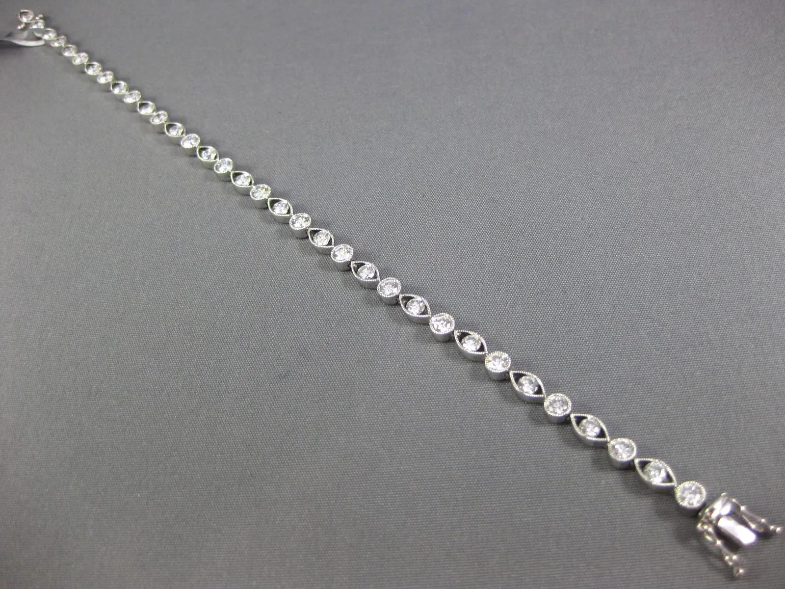 ESTATE 2.83CT DIAMOND 18KT WHITE GOLD 3D ROUND & MARQUISE ETOILE TENNIS BRACELET