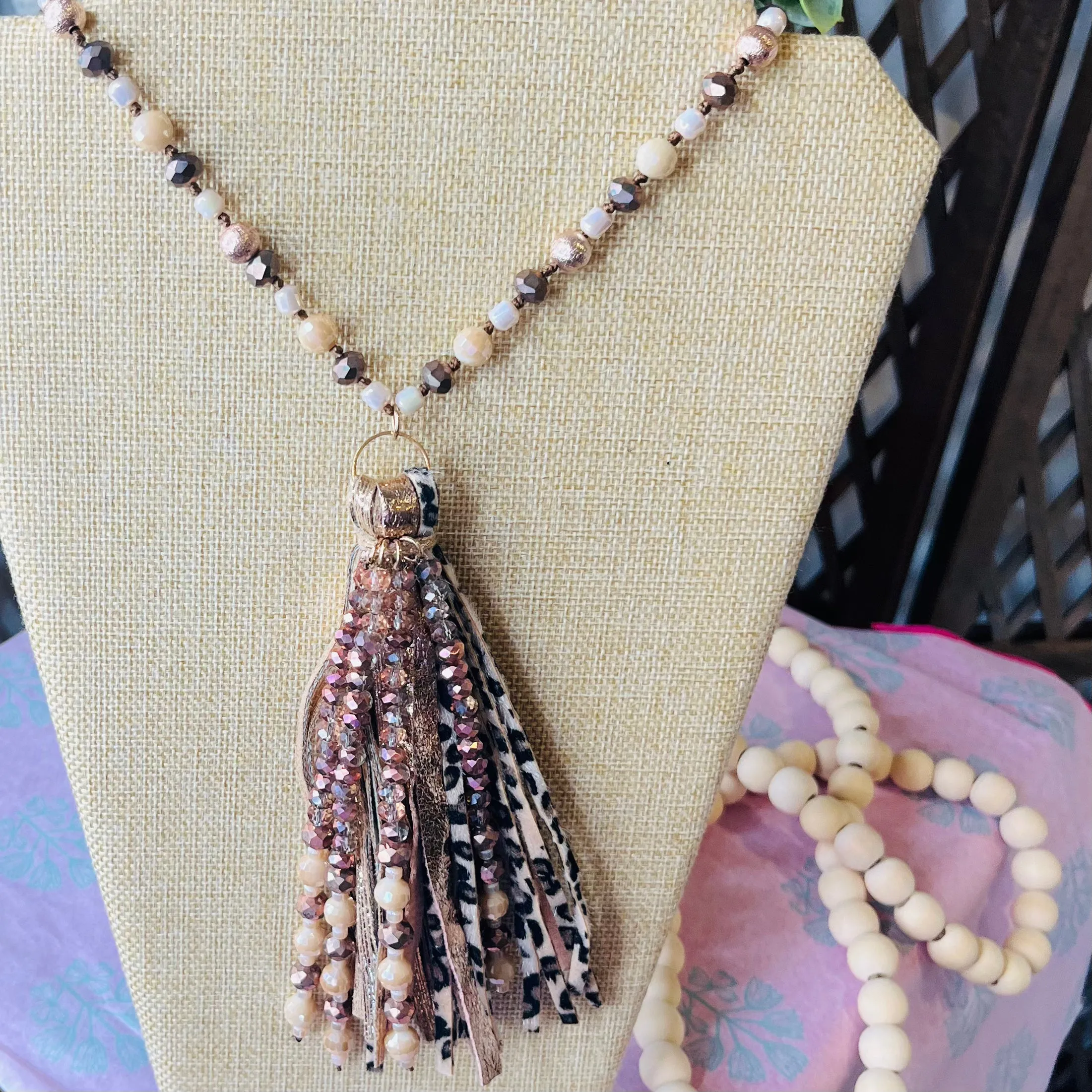 long beaded chain tassel necklace: black and brown w/ leopard tassel