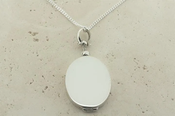 oval locket pendant on 55cm link chain