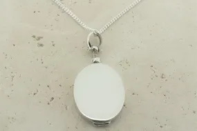 oval locket pendant on 55cm link chain