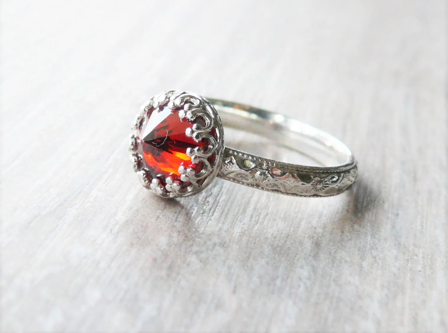 Red Cubic Zirconia Ring with Sterling Silver Floral Band